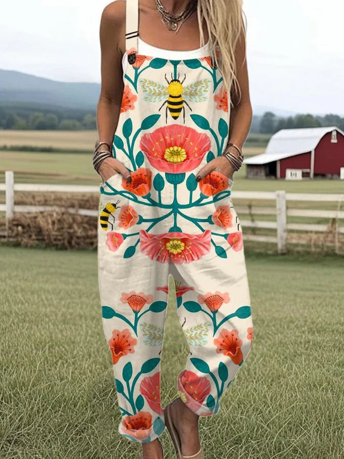 OLIVIA – SOLNEDGÅNGSBLOMST VIDDE JUMPSUIT