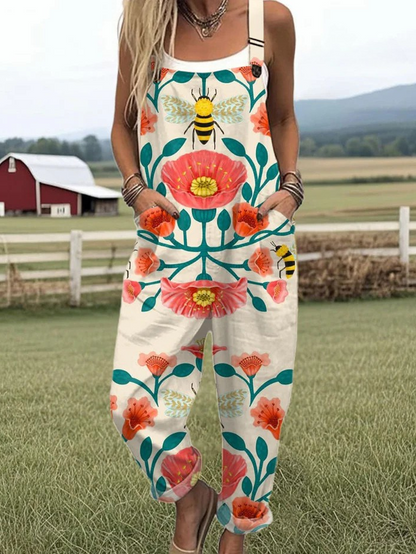 OLIVIA – SOLNEDGÅNGSBLOMST VIDDE JUMPSUIT